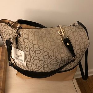 Brand new Calvin Klein reversible pocketbook